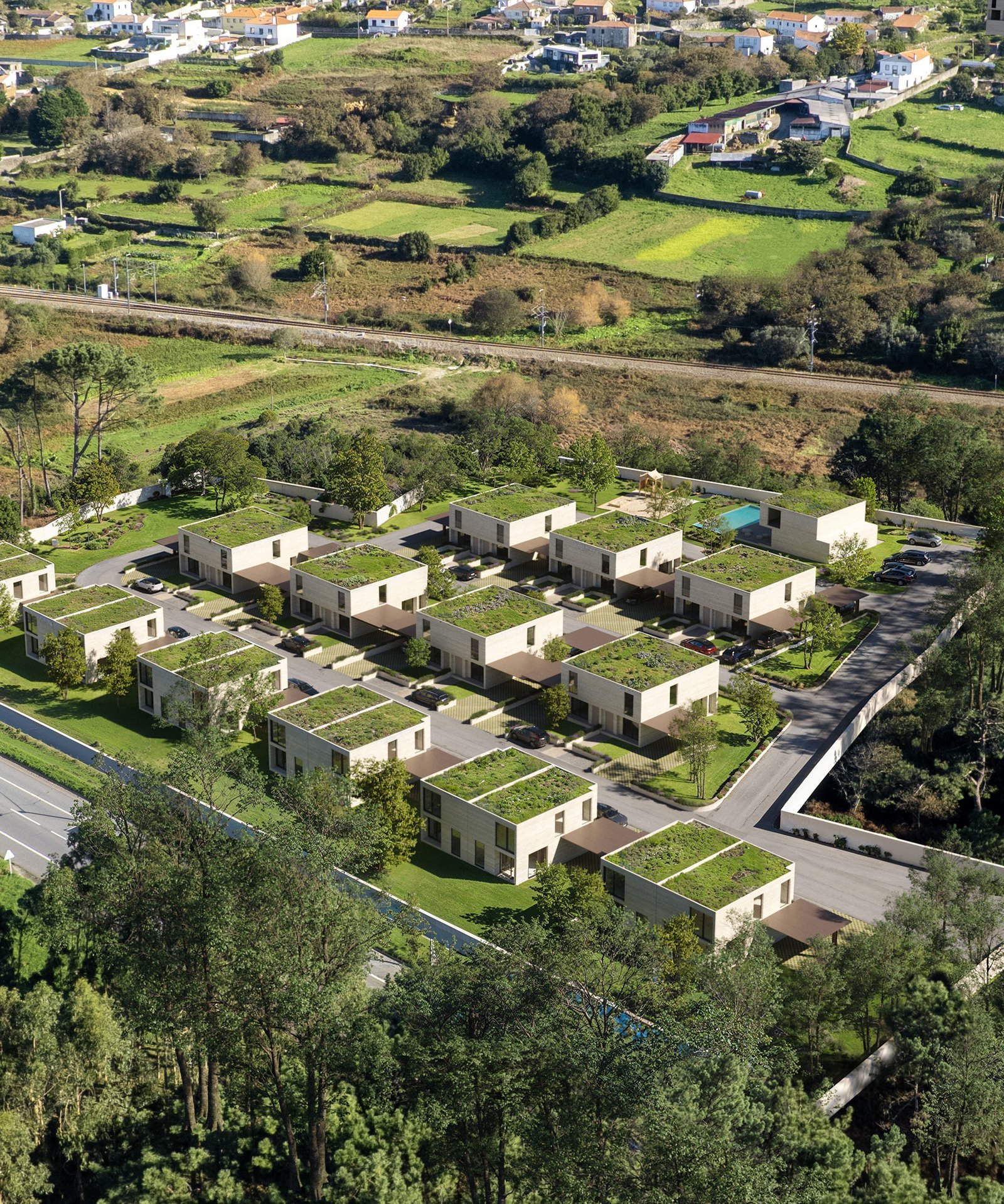 Vista aérea do empreendimento com coberturas verdes